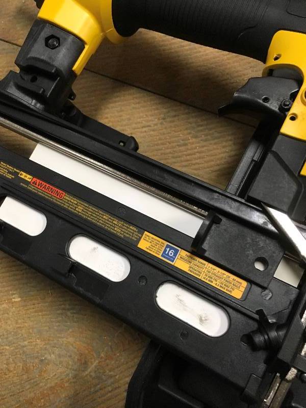 lot 96 image: DeWalt Pheumatic 16-Gauge 2-12 in. Finish Nailer in working conditions