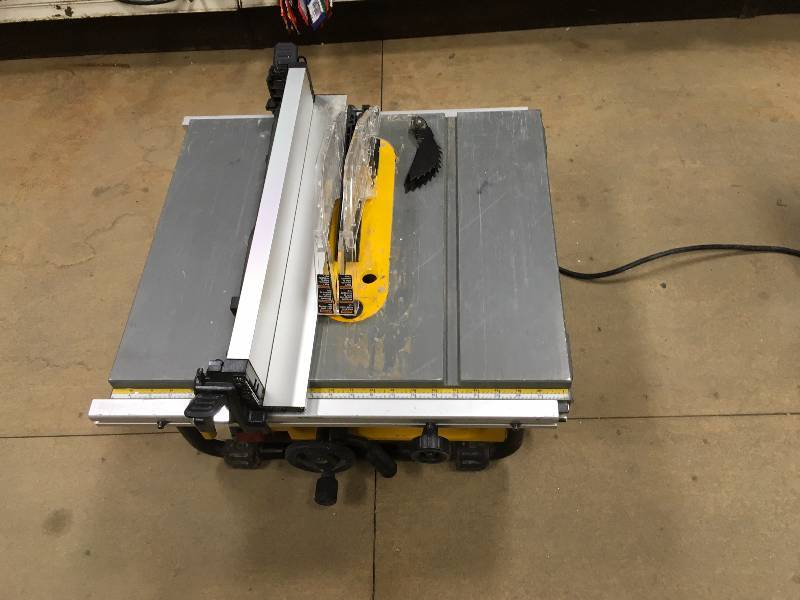 lot 119 image: DEWALT 15 Amp 10 in. Compact Job Site Table Saw with Site-Pro Modular Guarding System Model#  DWE7480 used in working condition