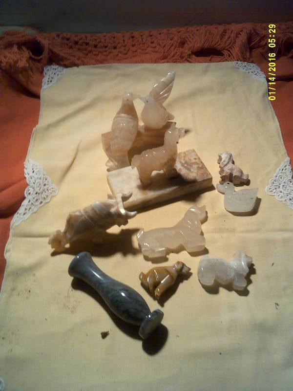 HAND CARVED STONE FIGURENES