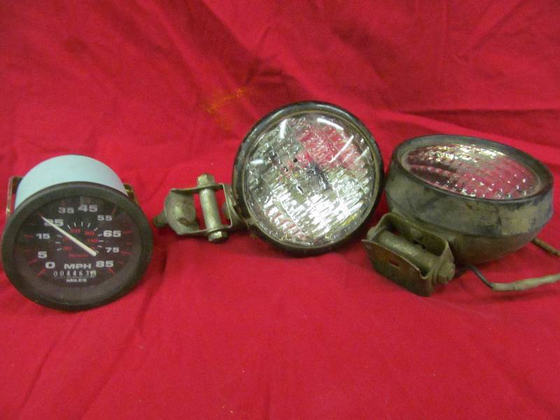 lot 9 image: speddometer,vintage auto head lamps