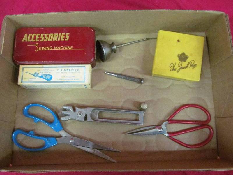 lot 83 image: sewing machine accessoires,awl, oil can