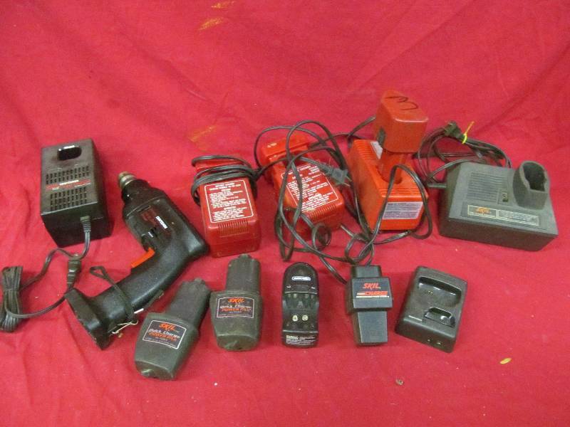lot 222 image: Skil battery and chargers