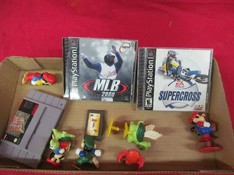 lot 224 image: Mario Brothers figures,sportgame DVD,