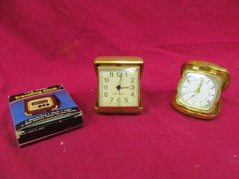 lot 274 image: vintage traveling alarm clocks