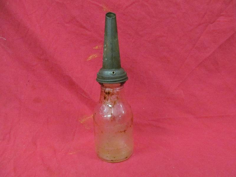 lot 291 image: vintage oil bottle