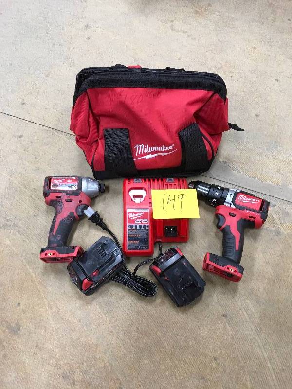lot 149 image: M18 18-Volt Lithium-Ion Cordless Compact Brushless Hammer DrillImpact Combo Kit (2-Tool)used in good working condition