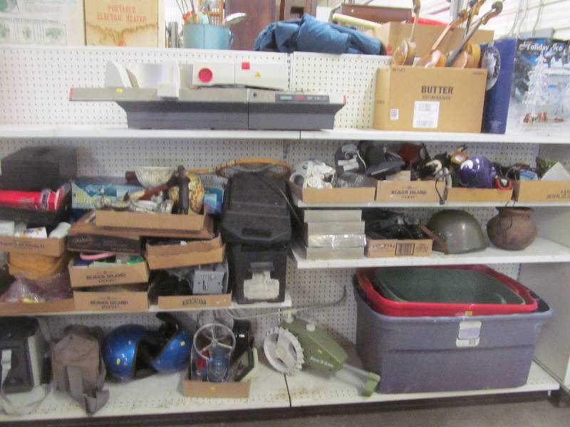lot 2 image: helmets, cups, home dcor, cooler