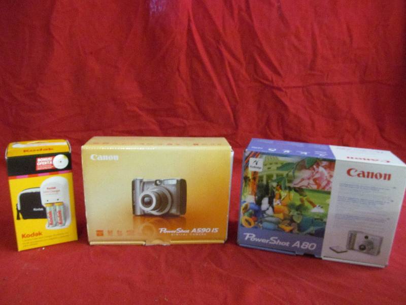 lot 147 image: Canon cameras