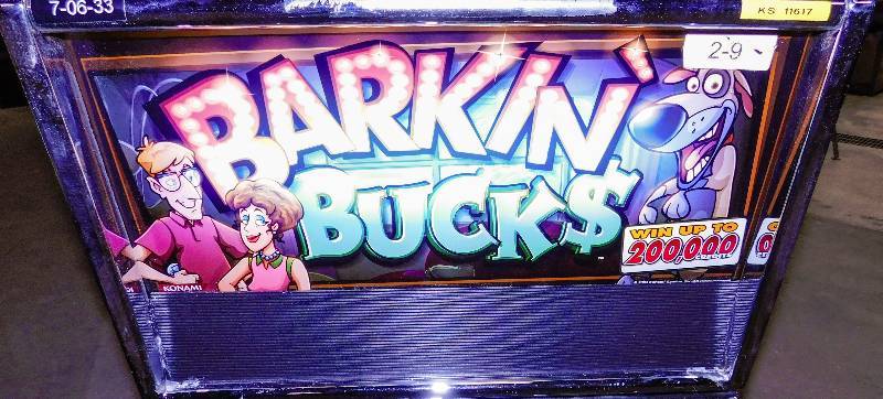 lot 1008 image: KONAMI BARKIN BUCKS VIDEO SLOT MACHINE