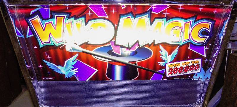 lot 1009 image: KONAMI WILD MAGIC VIDEO SLOT MACHINE