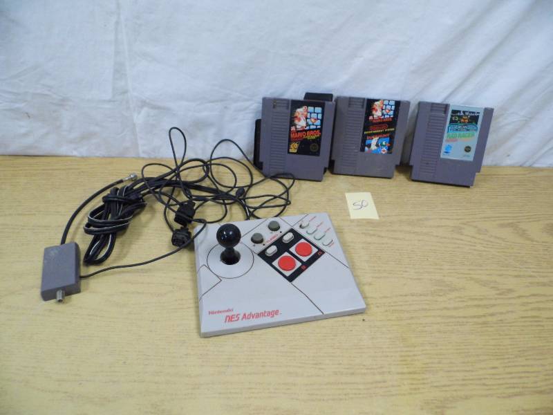 lot 50 image: NES Controller  Nintendo Games