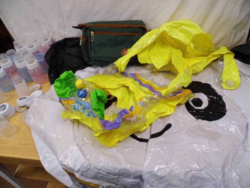 lot 57 image: Baby Pool - Bottles