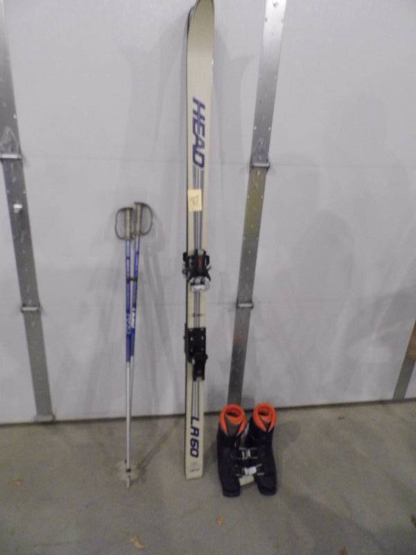 lot 187 image: Head Skis - Poles - Boots