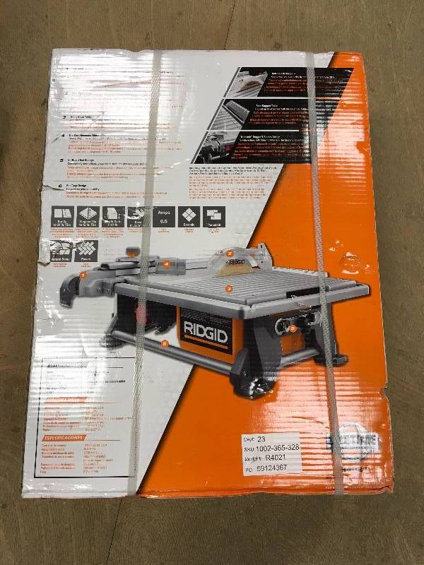 lot 10 image: Ridgid 120-Volt 7 in. Table Top Wet Tile Saw R4021 not used