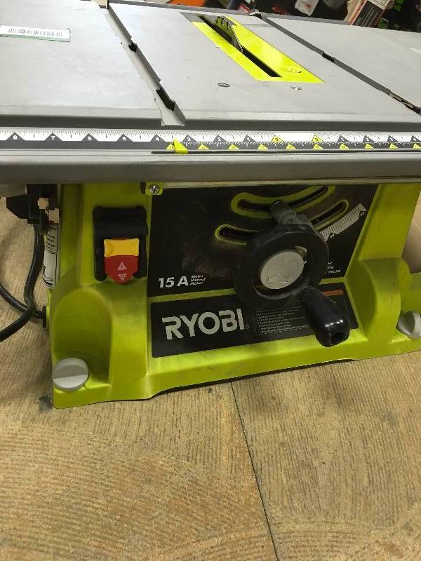 lot 11 image: Ryobi Ridgid 120-Volt 7 in. Table Top Wet Tile Saw R4021 not used RTS21G used in very good condition missing guard