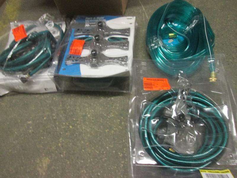 4 hoses some with sprinklers all op...