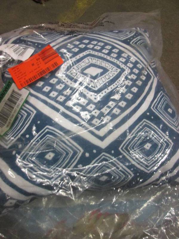 4 throw pillows in a plastic tote ...