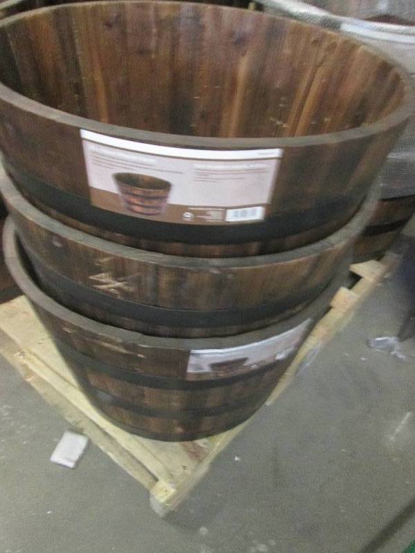 3-26 round wooden barrels some may...