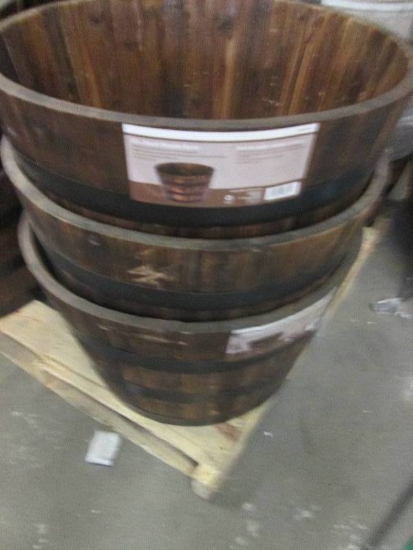 3-26 round wooden barrels some may...