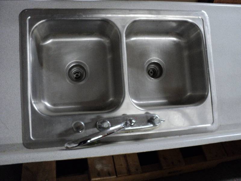 lot 21 image: kitchen counter with double sink, 7...