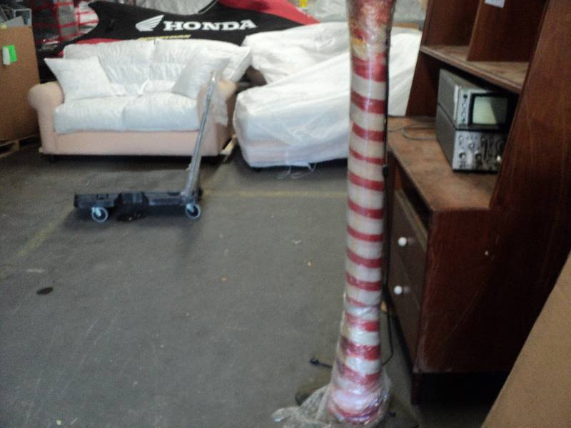 lot 80 image: red and white light, 59in tall...