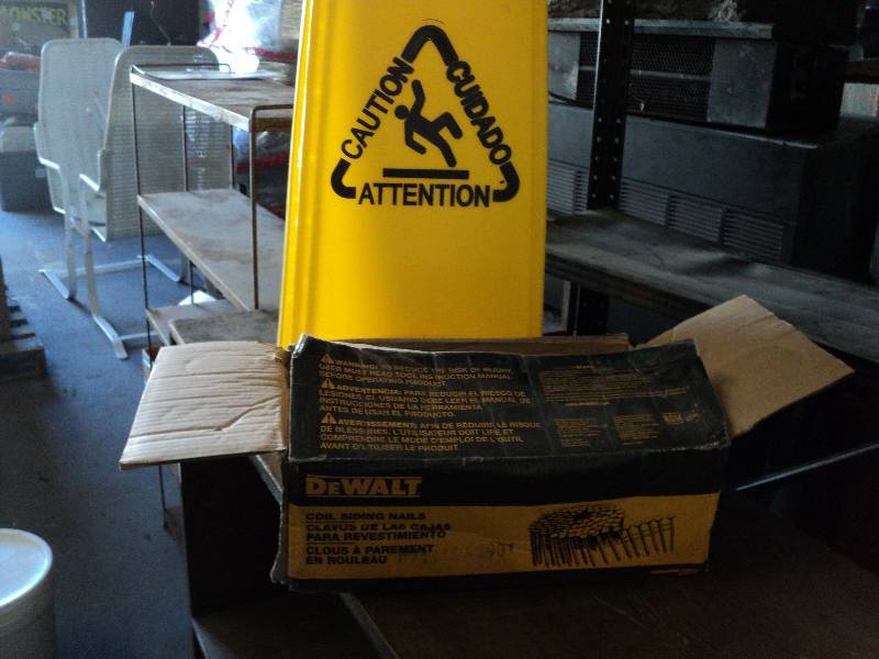 lot 93 image: DeWalt coil siding nails and cautio...