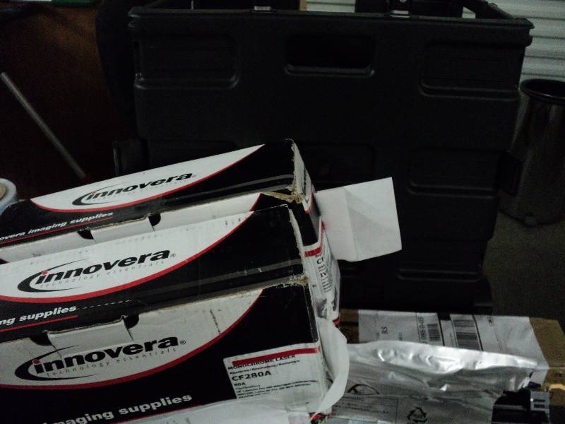 lot 130 image: black container and office supplies...