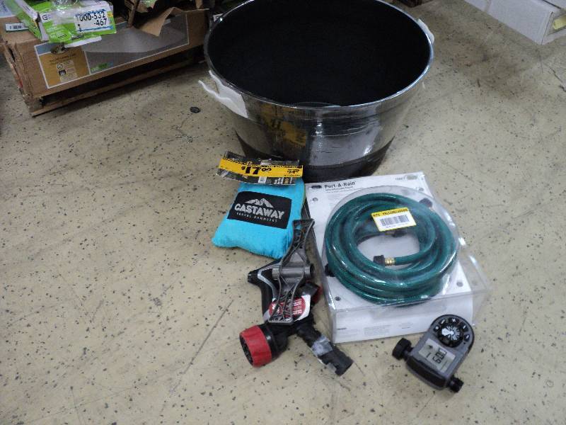 lot 188 image: whisky barrel planter, hose, and tr...