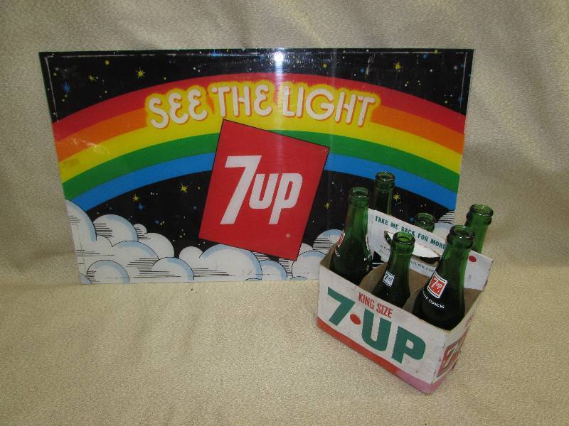 lot 123 image: VINTAGE 7-UP BOTTLES AND CARDBOARD CARRY PACK, PLEXI 7-UP SIGN