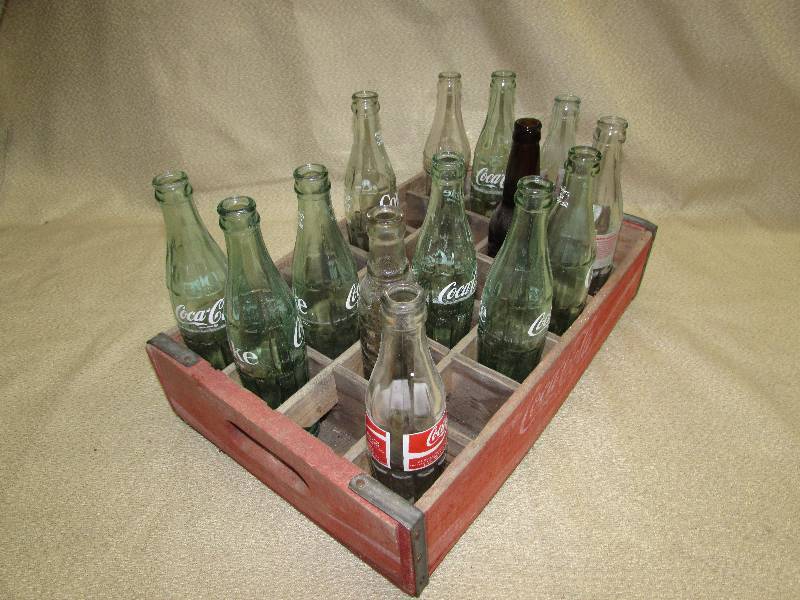 lot 129 image: VINTAGE COCA-COLA CRATE AND BOTTLES