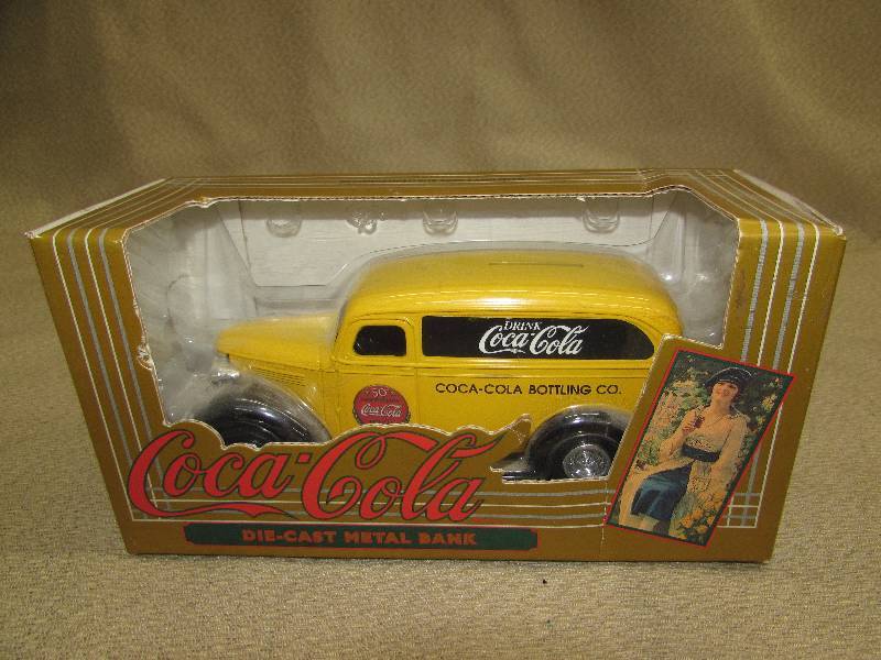 lot 143 image: COCA-COLA DIE CAST METAL BANK