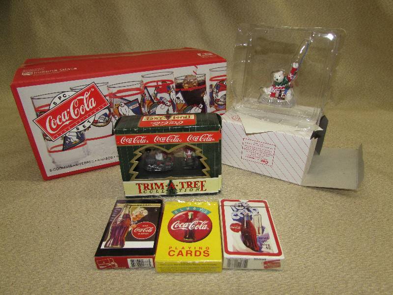 lot 144 image: COCA-COLA COLLECTIBLES, SET OF 8 GLASSES, NEW IN BOX. HOLIDAY ORNAMENTS, PLAYING CARDS