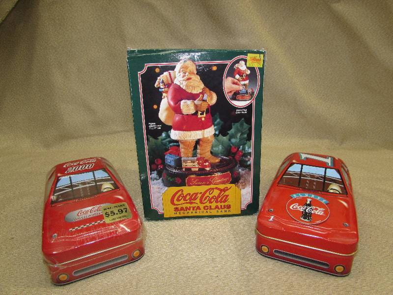 lot 145 image: COCA-COLA COLLECTIBLES,TIN CARS AND COIN BANK