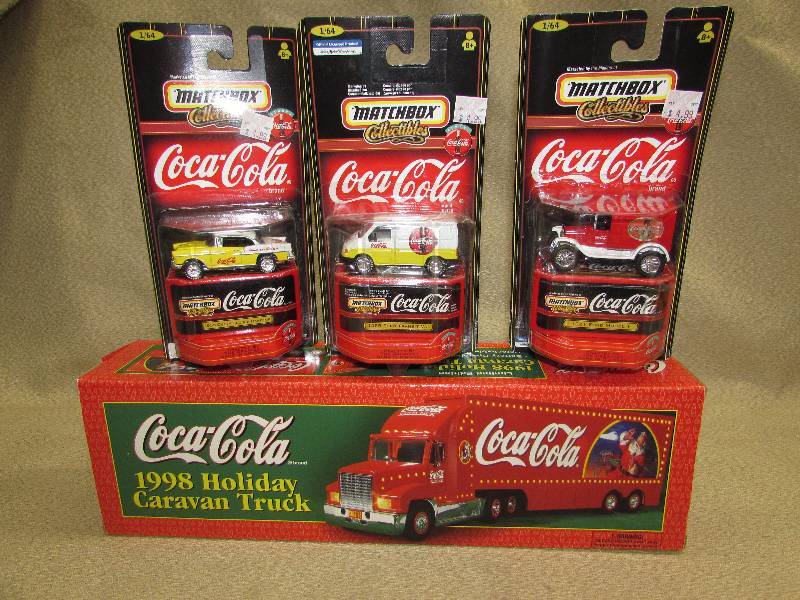 lot 150 image: COCA-COLA MATCHBOX CARS AND 1998 HOLIDAY CARAVAN TRUCK
