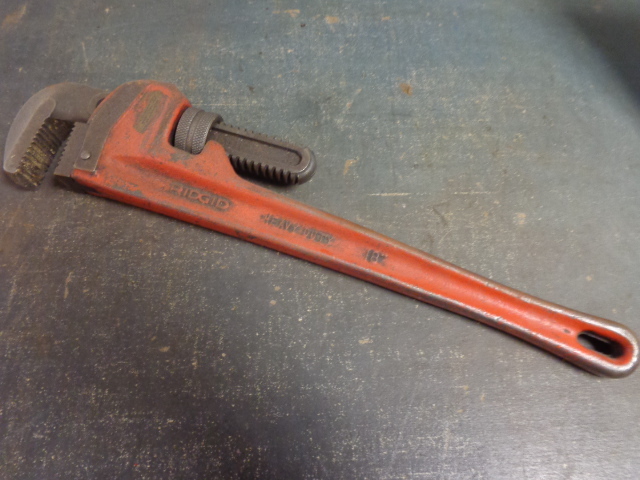 lot 25 image: Hammer and Wrench