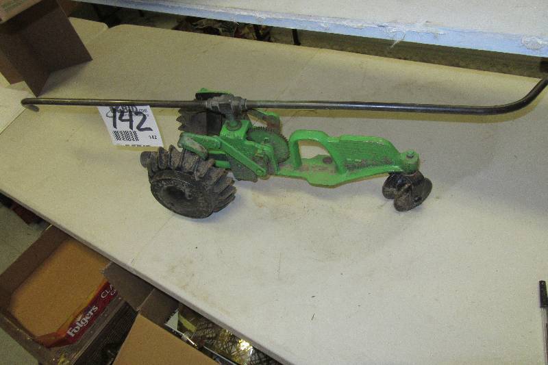 lot 142 image: Walking Lawn Sprinkler