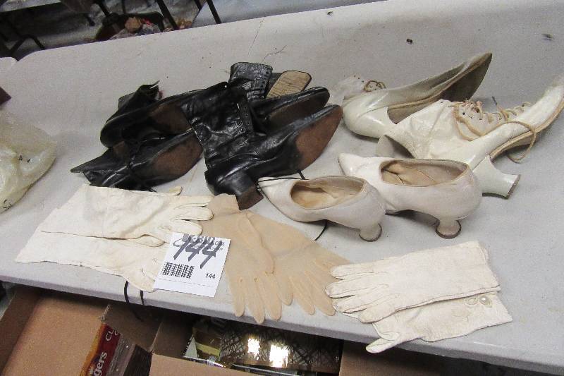 lot 144 image: Vintage High Heel Tie up shoes, gloves..