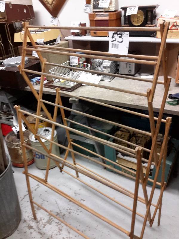 lot 53 image: 5 ft wood step ladder and folding wood clothes rack