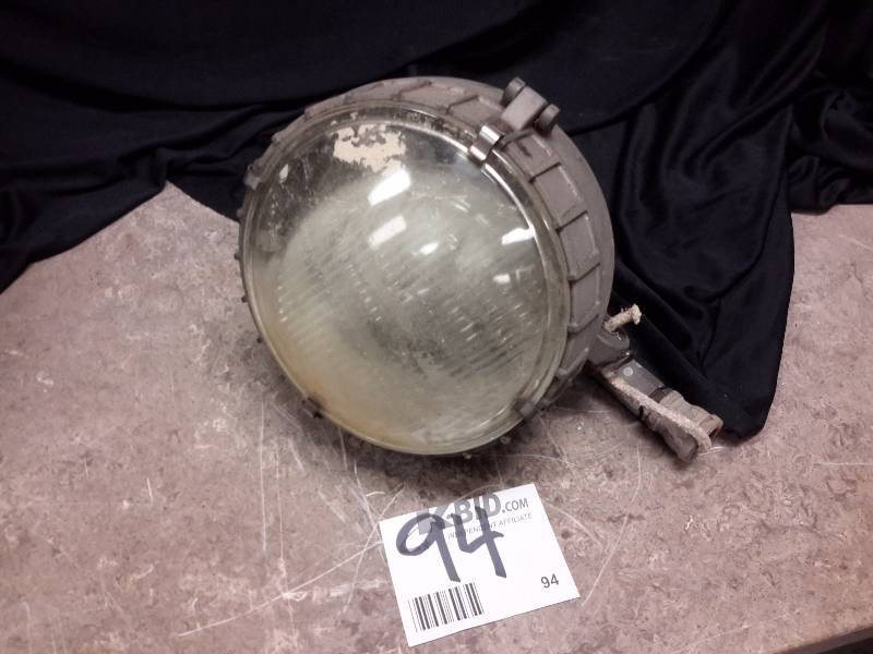 lot 94 image: Vintage vehicle head lamp