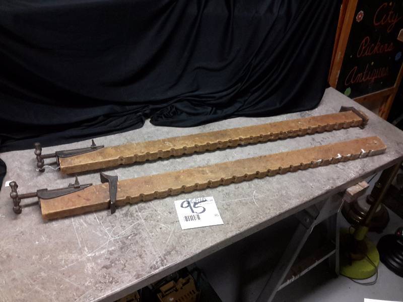 lot 95 image: 2 Vintage Wood Clamps.. Approx 48 in l