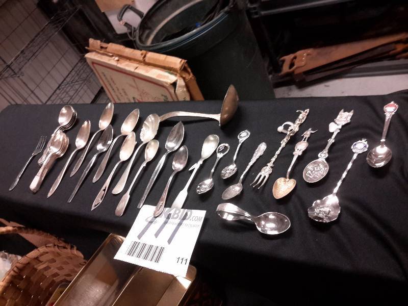lot 111 image: Lot of silver plate spoons.. Some are themed