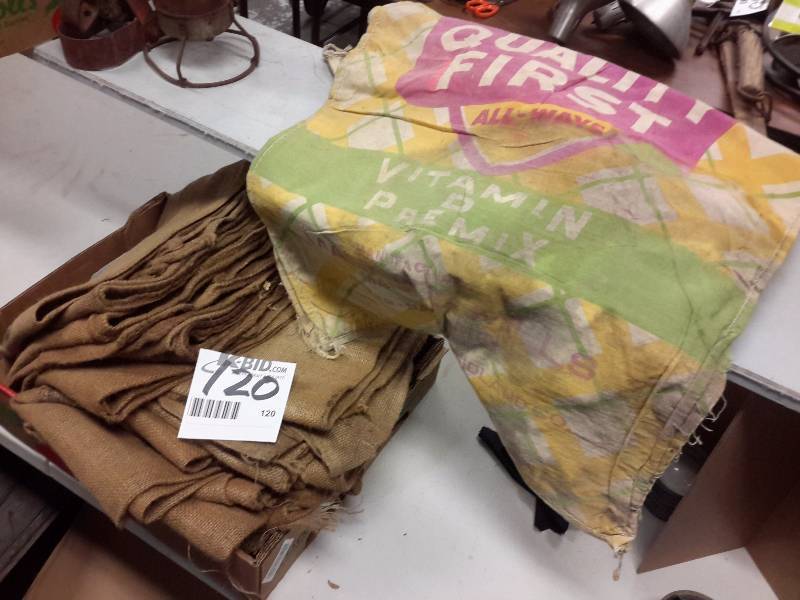 lot 120 image: 10, burlap bags and a Cloth Logoed flour sack