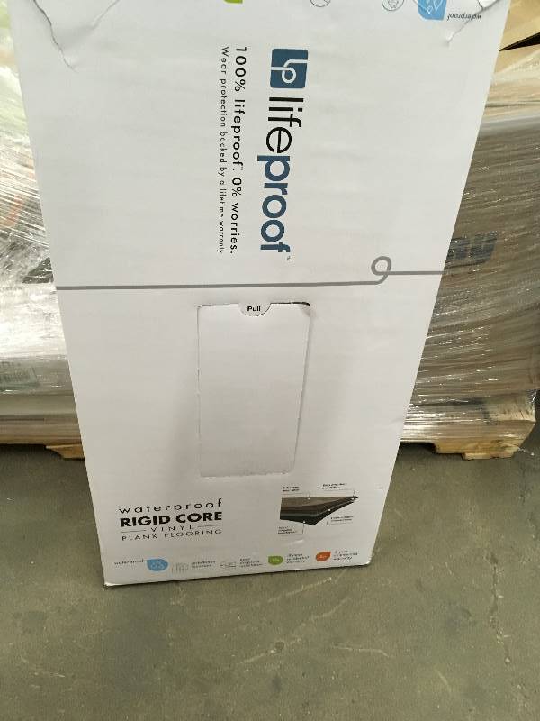 lot 24 image: Lifeproof Starr Light 16 in. x 32 in. Luxur Vinyl Tile Flooring (24.89 sq. ft.case)  open box never used