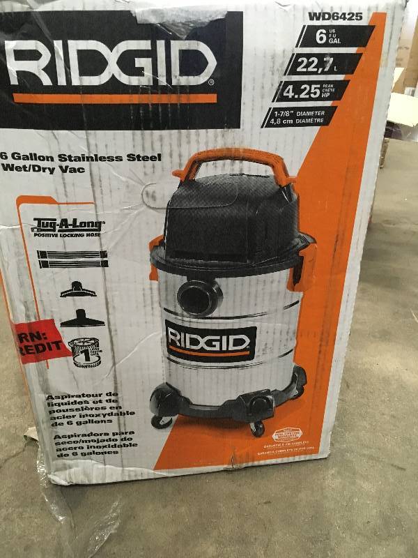 lot 29 image: Ridgid 6 Gallon Stainless Steel WetDry Vac in like New working conditions