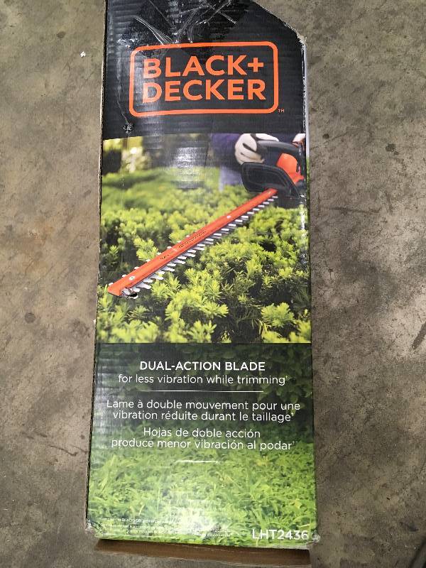 lot 31 image: Black & Decker Dual-Action Blade Hedge Trimmer in like New working conditions