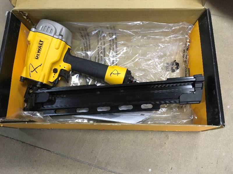 lot 43 image: DeWalt 21 Degree Plastic Round Head Framing Nailer in like New working conditions