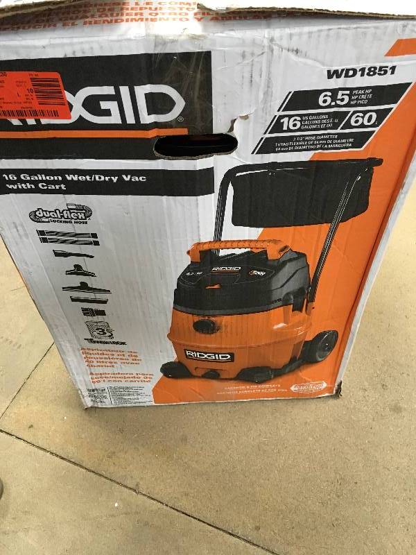 lot 50 image: Ridgid 6 Gallon WetDry Vac with Cart - Missing Tire bar  in like New conditions