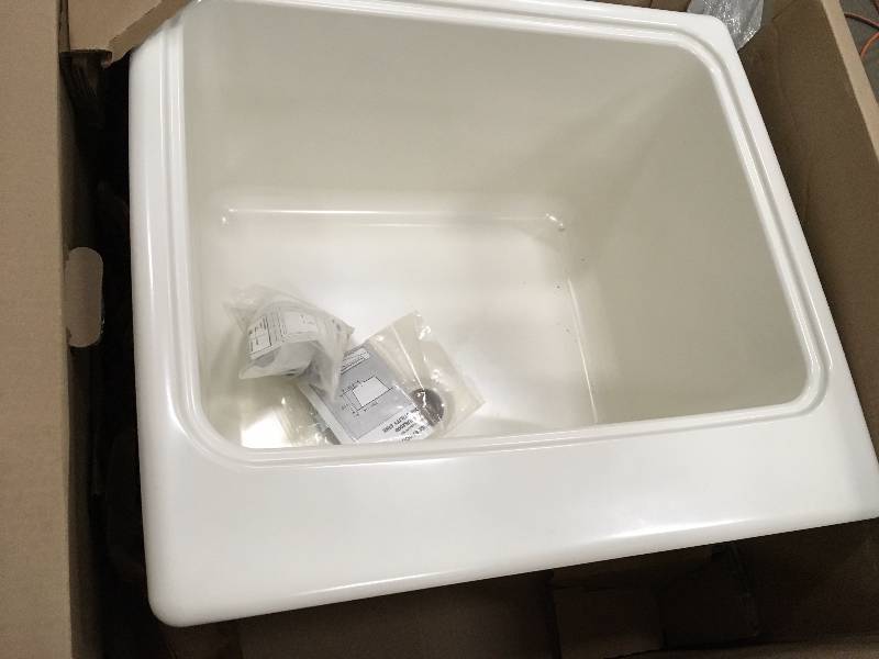 lot 62 image: Swan 25 in. x 22 in. x 13-916 in. Solid Surface Utility Sink open box never used