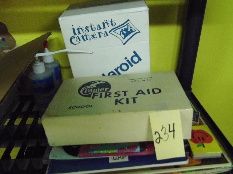 lot 234 image: First Aid - Books - Poaroid