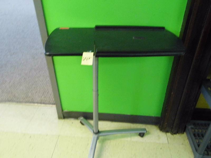 lot 242 image: Rolling Table